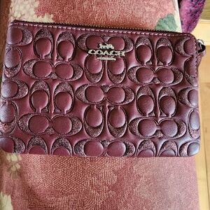 Coach Embossed Signature Wristlet - Wine